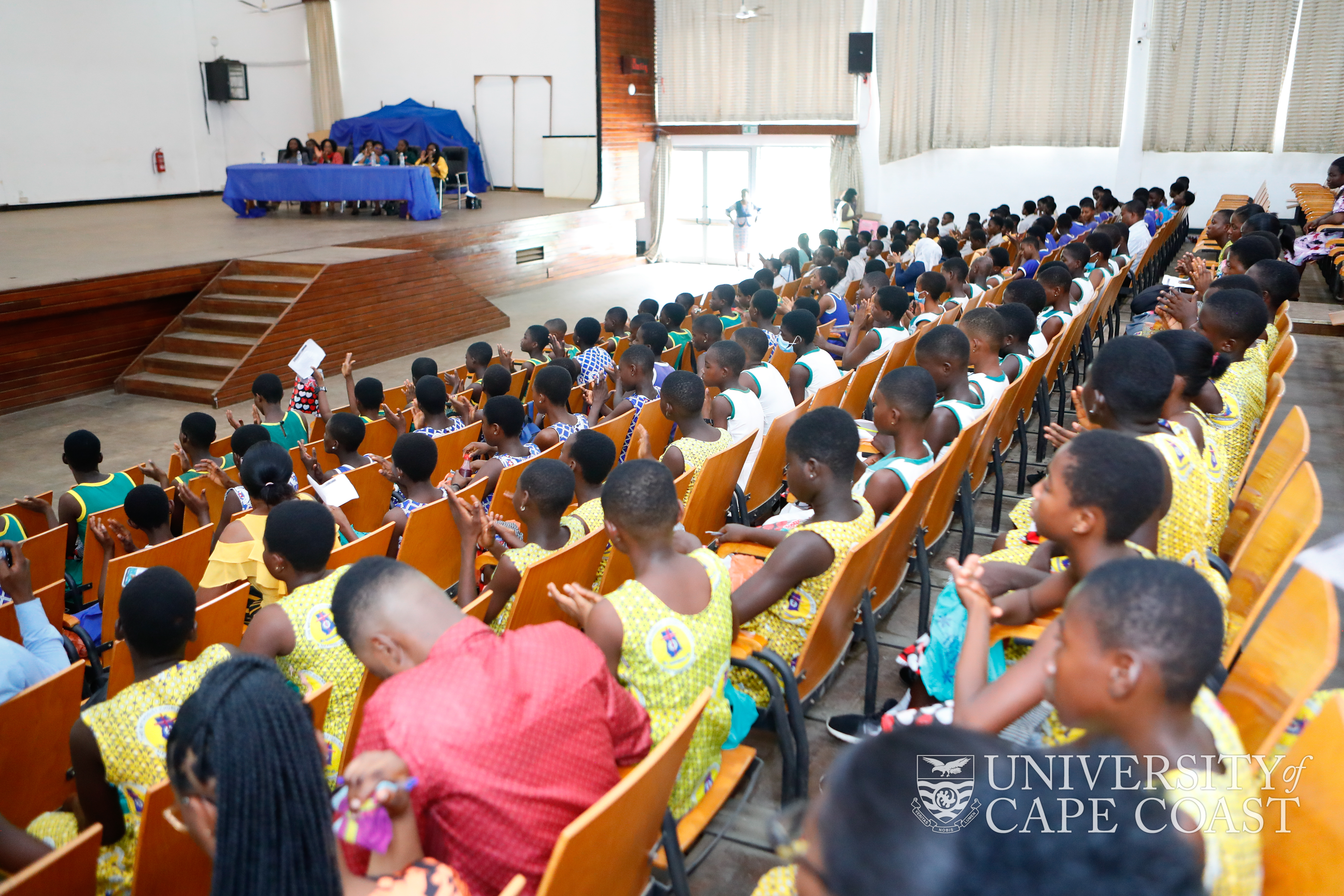 Participants listening to presentations at the programme