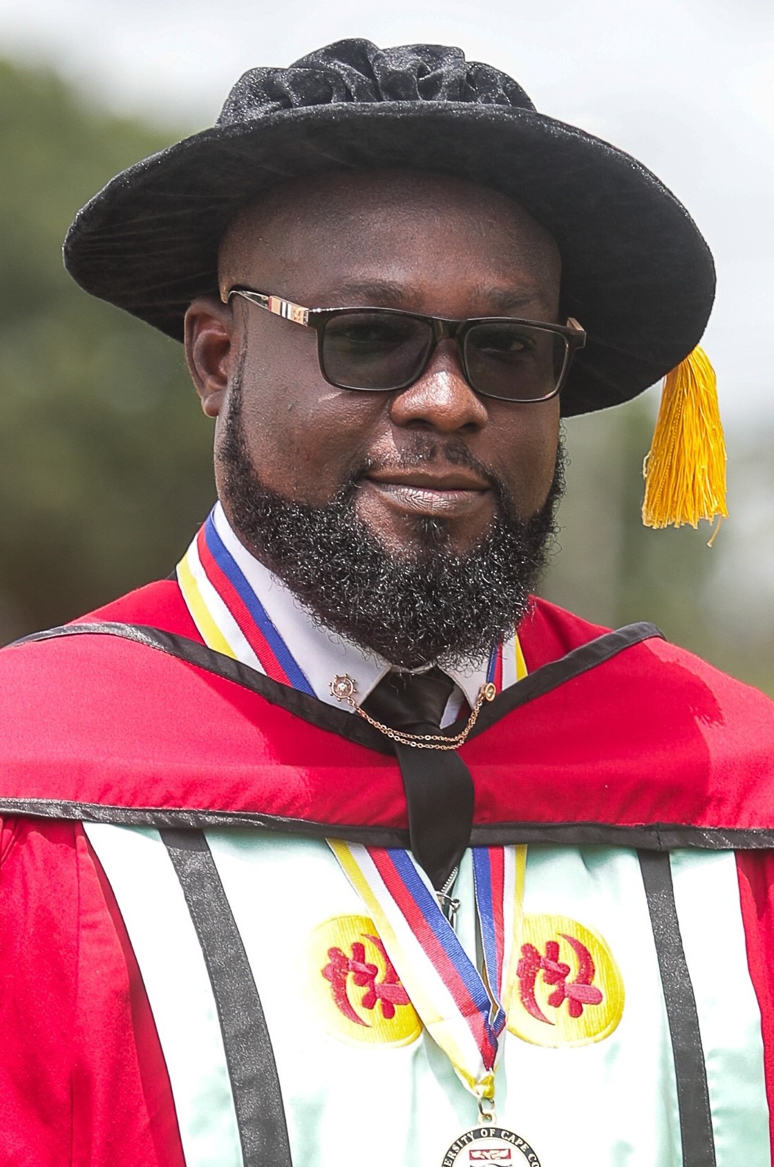 Dr. Wisdom Komabu